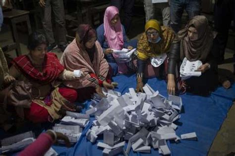 Voters cast ballots in a Bangladesh election marred by violence and an opposition boycott